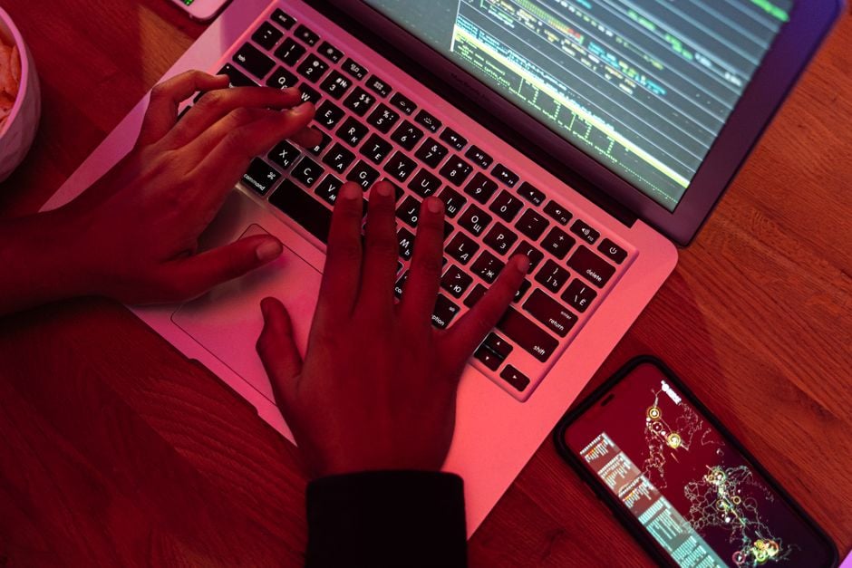 programmer using Coq on laptop formal verification