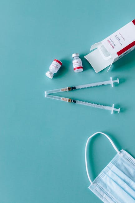 vial syringe mRNA vaccine laboratory research lipid nanoparticle