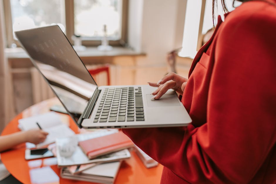 close-up laptop screen job posting Arabic professional