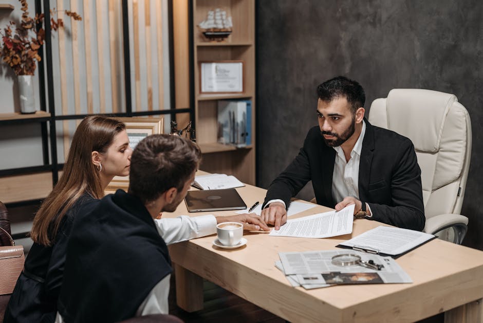 developer freelancer laptop contract negotiation documents coffee arabic office