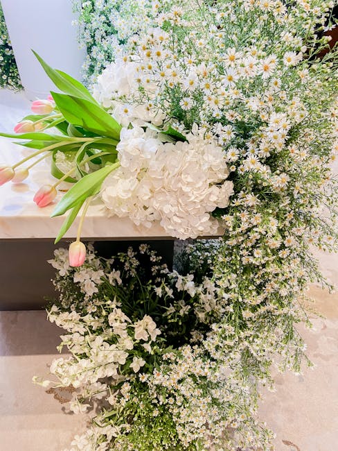 wedding centerpiece low pollen tulips hydrangeas peonies