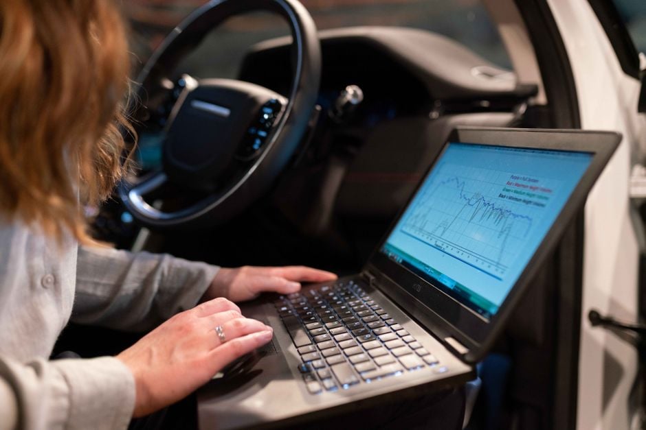 AI deployment monitoring dashboard engineers laptop