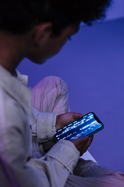 teenager using smartphone-based AI companion app at night bedroom