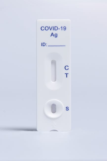 rapid antigen test kit closeup healthcare worker