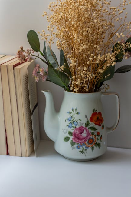 repurposed teapot vase flowers DIY