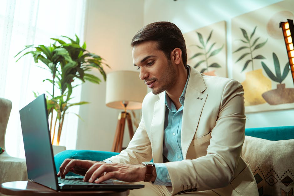 property manager using laptop in Dubai apartment