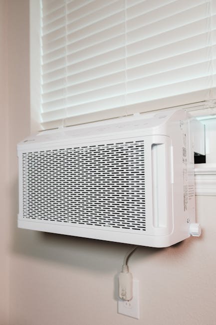 Wall-mounted air conditioner installed in a residential setting, providing cooling comfort.