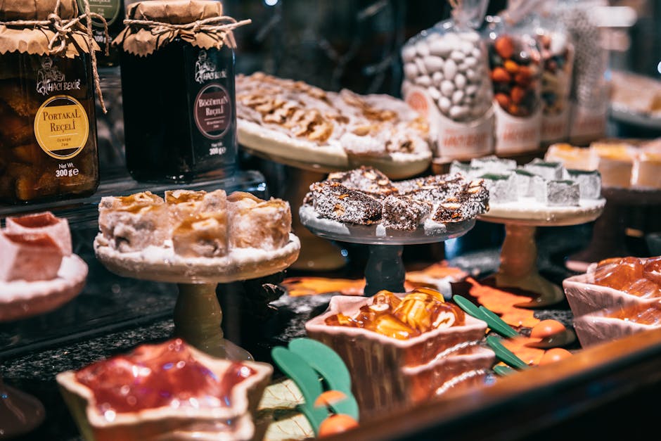 Assorted Turkish delights and jam on showcase of market selling delicious traditional sweets