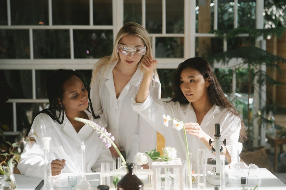 laboratory scientist examining cotton plants