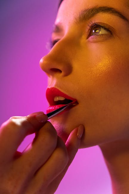 close-up makeup application filmed on smartphone studio lighting