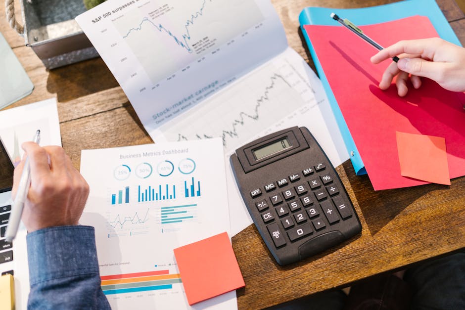 startup founders reviewing cash runway spreadsheet office