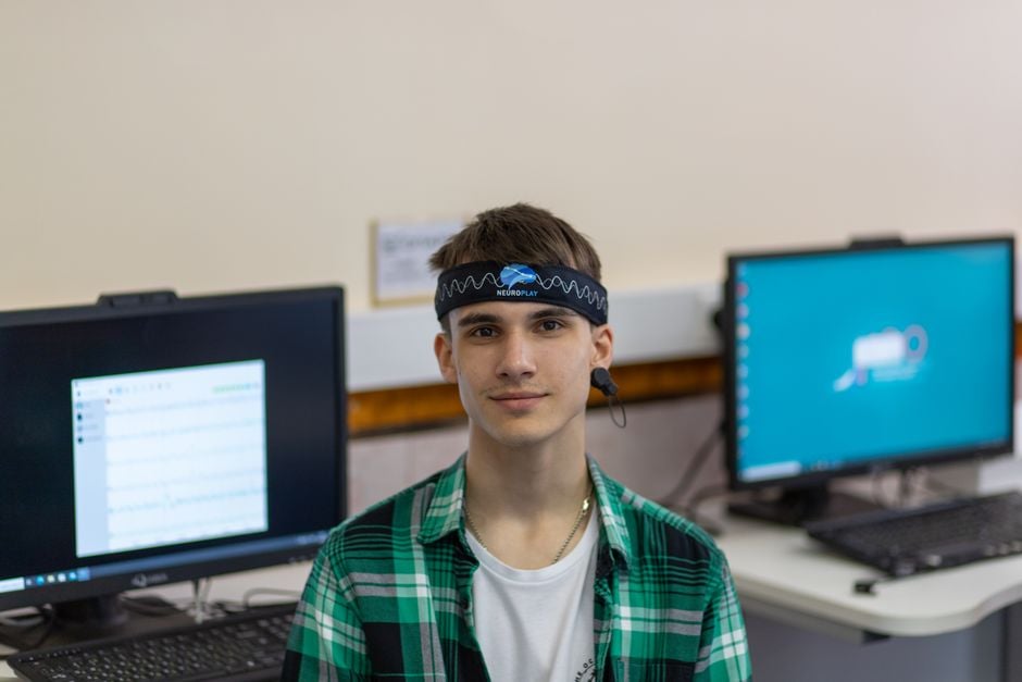 student wearing EEG headband studying Muse classroom