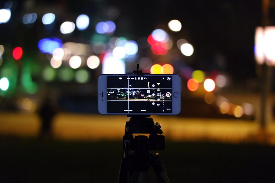 nighttime urban photographer tripod park lights long exposure