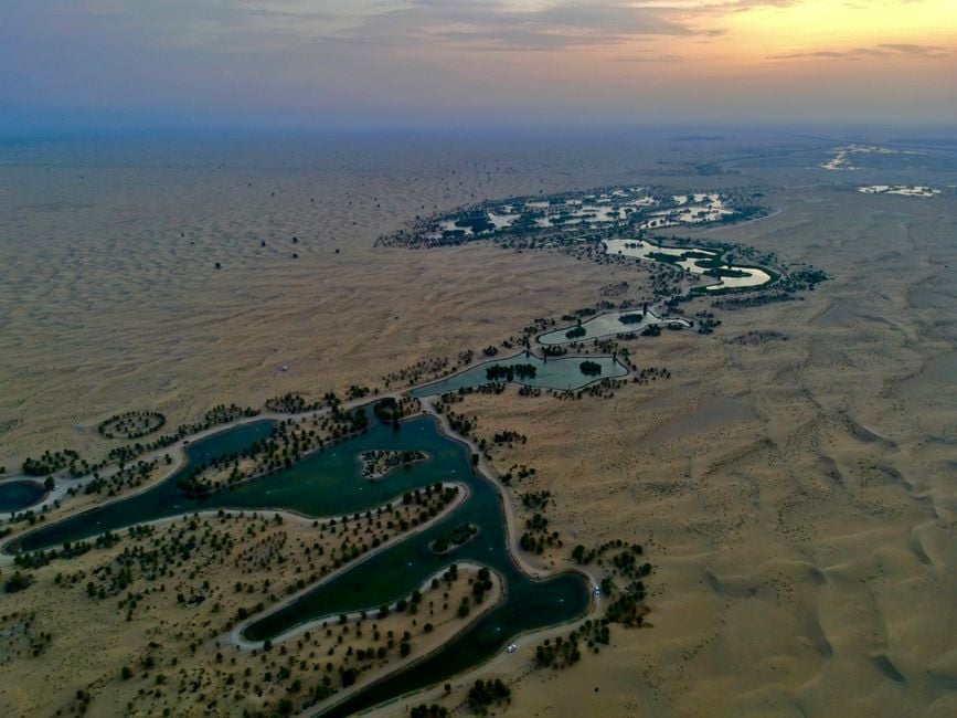 Al Qudra Lakes UAE sunset cycling picnic