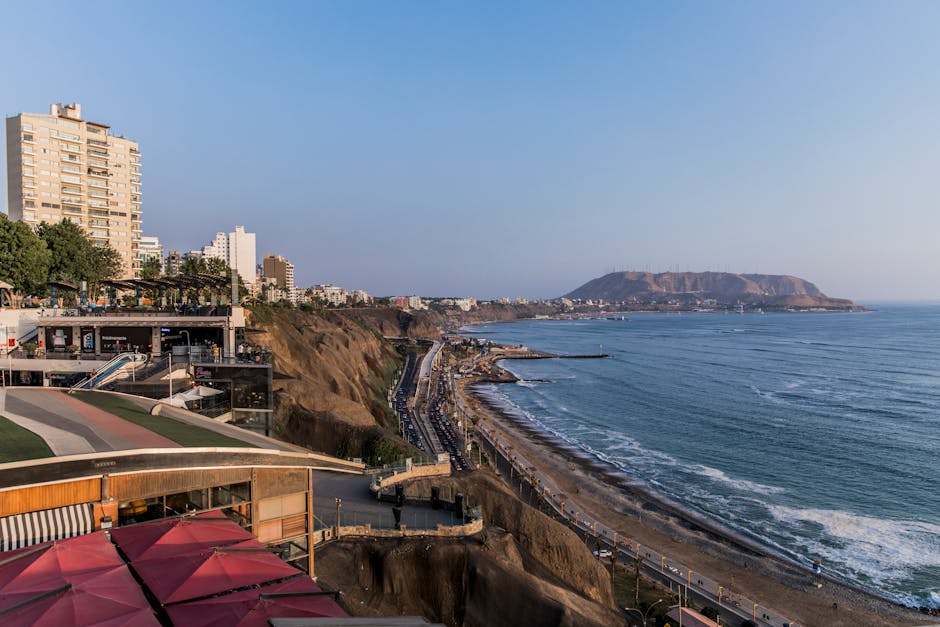 Explore the stunning coastal view of Miraflores, Lima, capturing the vibrant sea and cityscape.