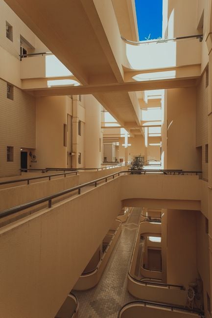 modern apartment keys handover Abu Dhabi residential building interior community