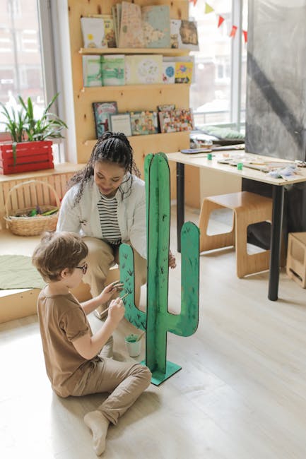 children collaborative art project preschool classroom teacher guiding