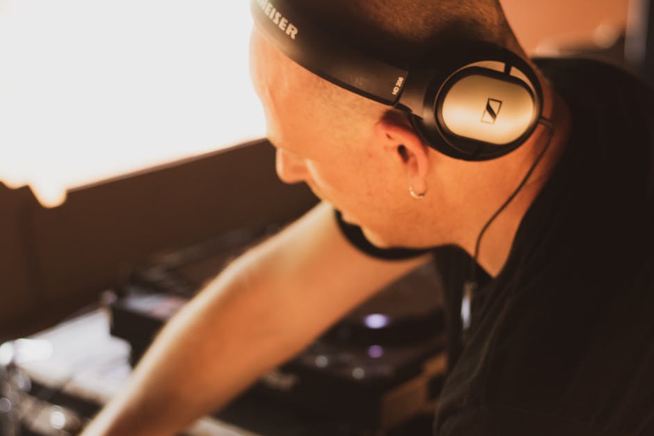 live audio event microphone host checking soundboard studio monitoring