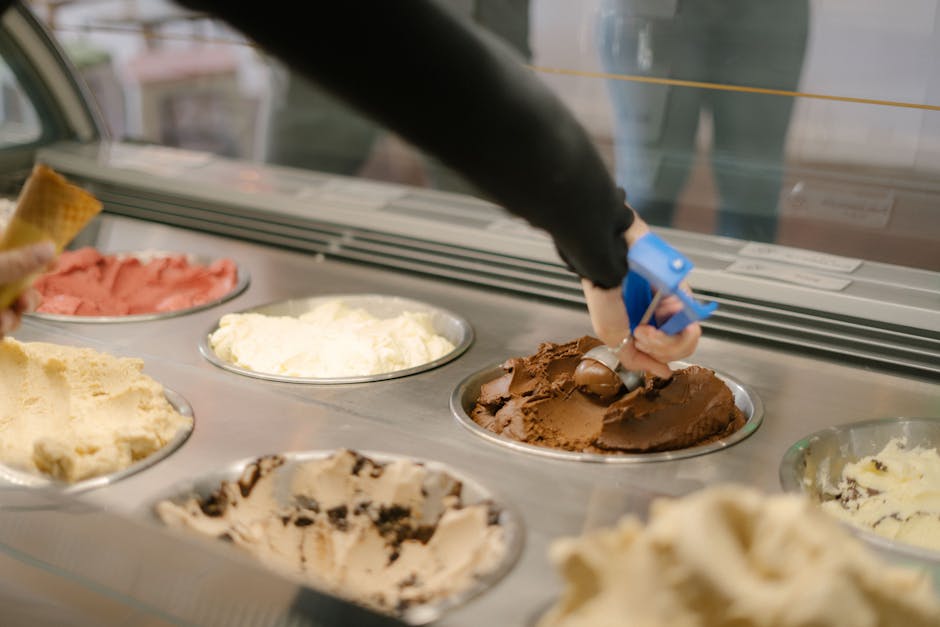 local artisan ice cream maker shop scooping