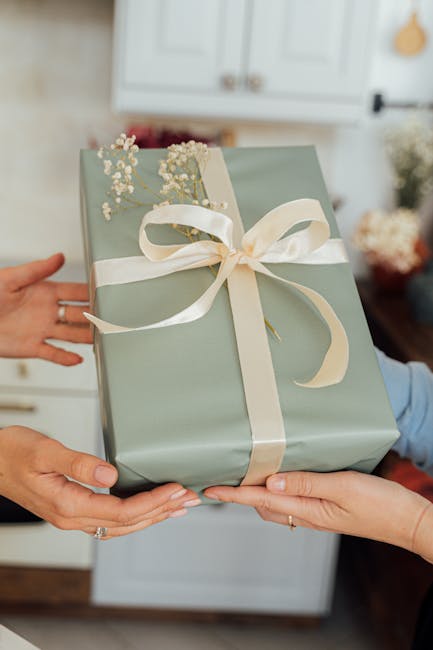 corporate floral gift box with ribbon on desk