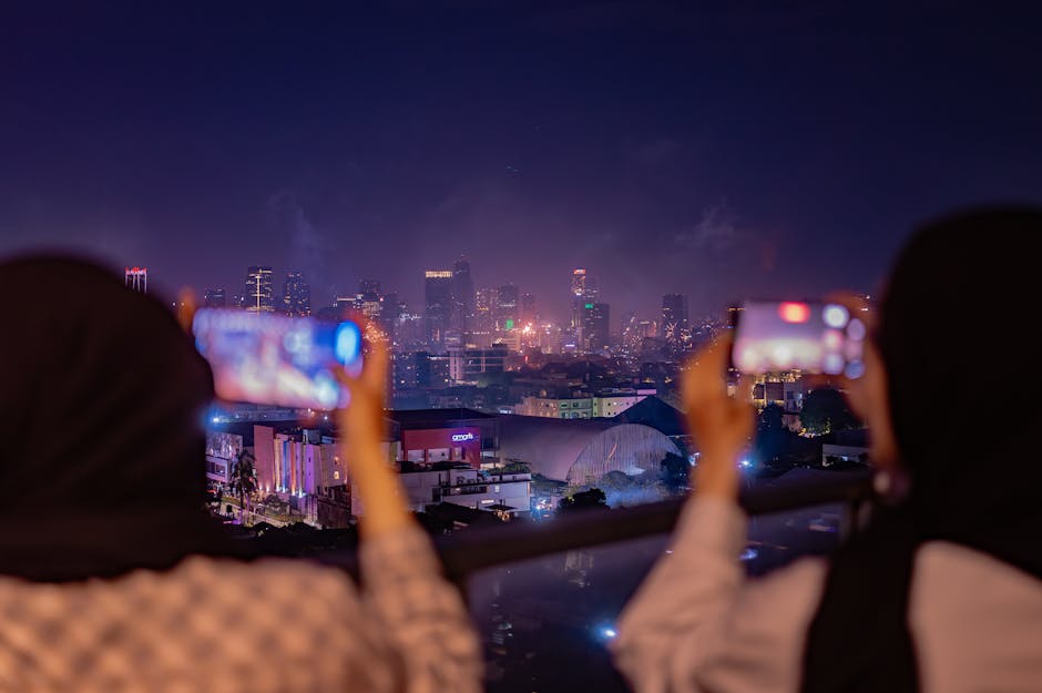 A vibrant nighttime view of Jakarta's skyline captured during a firework display, emphasizing city life and celebrations.
