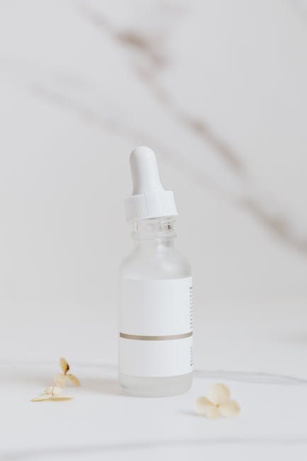 dropper serum close up Korean skincare packaging minimal