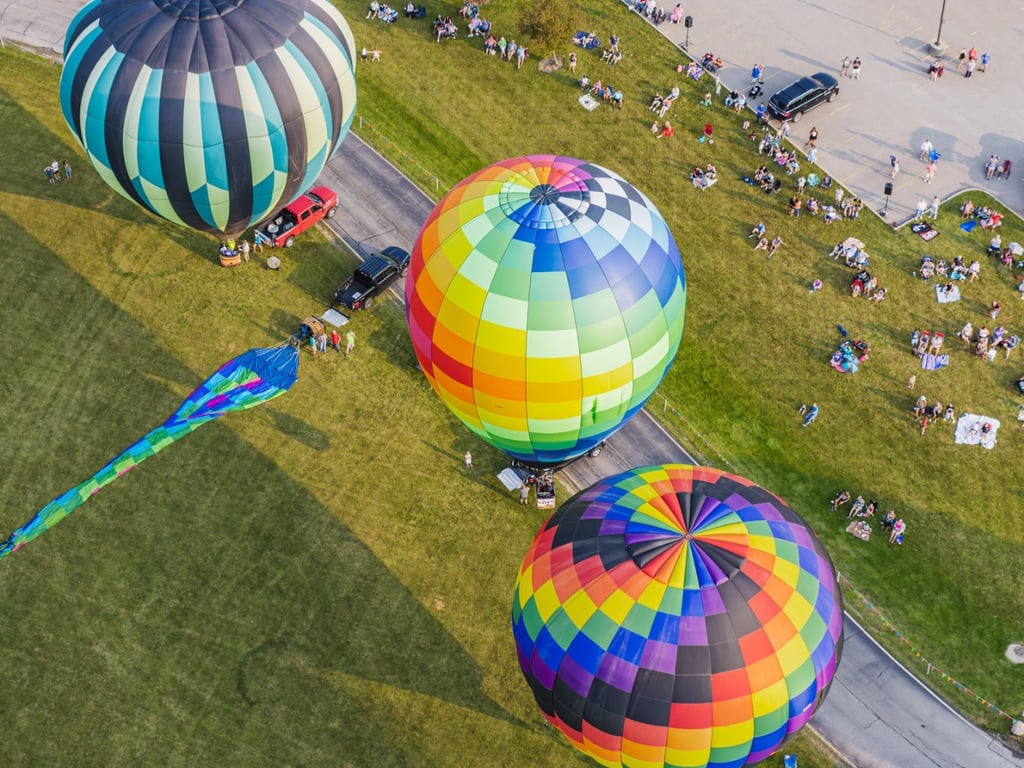 View looking up at a hot air balloon from below