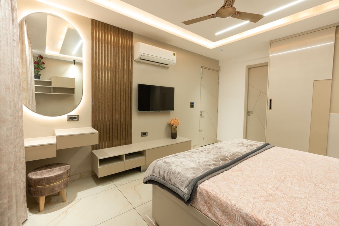 Wide view of a warm apartment bedroom