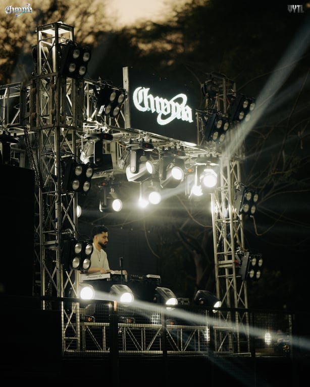 Chroma stage screen glowing above the rig at night