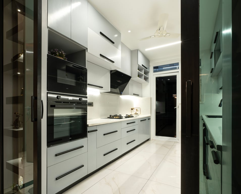 Low angle view of a white apartment kitchen