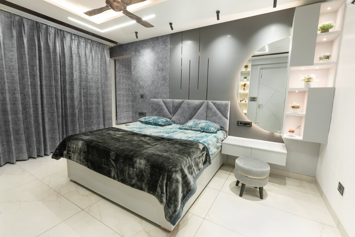 Bedroom corner with curtains and warm paneling
