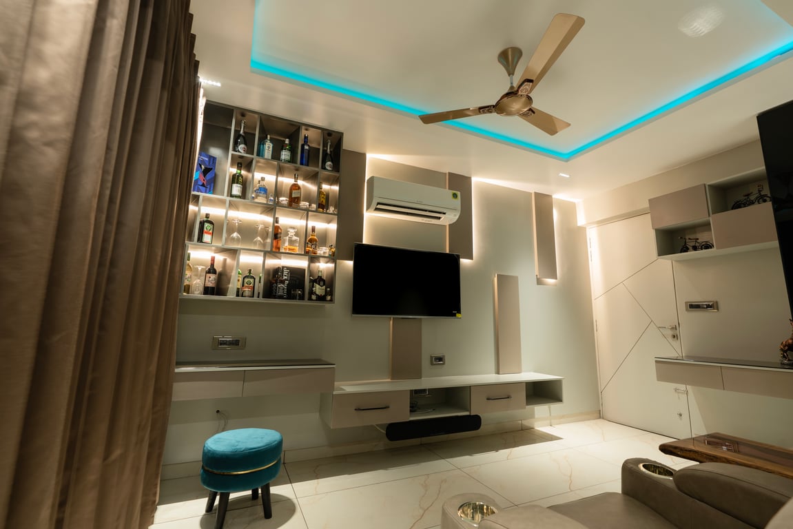 Apartment bedroom with television and vanity wall
