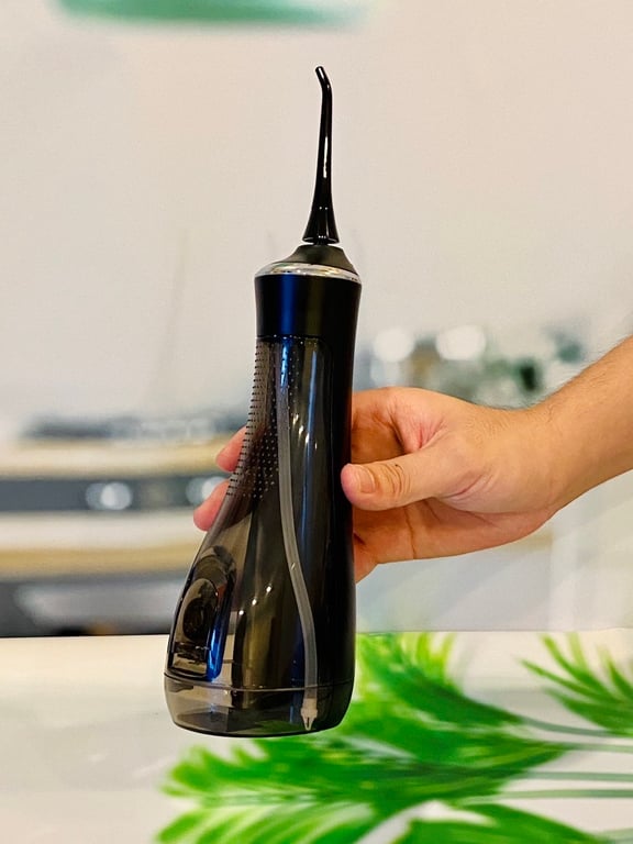 MÁY TĂM NƯỚC CẦM TAY DOZZI