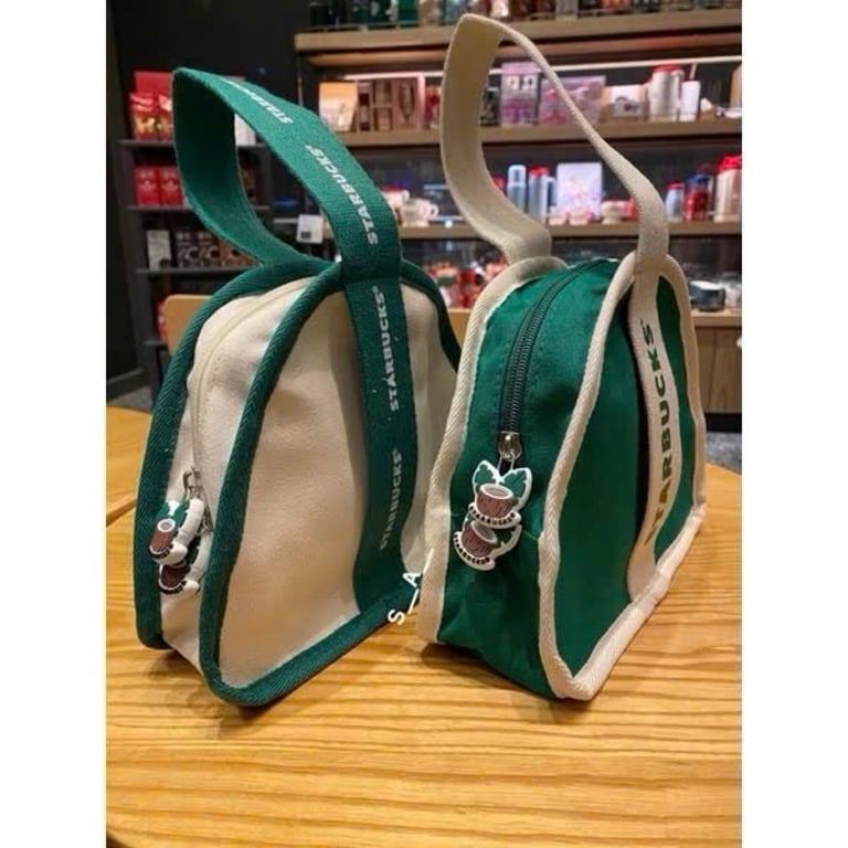 túi nhỏ xinh hình tam giác . Mẫu mới nhất có kèm khoá lo.go S.T.A.R.B.U.CK