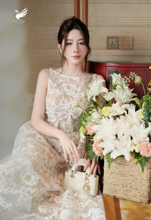 Đầm tiệc ren hoa phối nơ Khâu