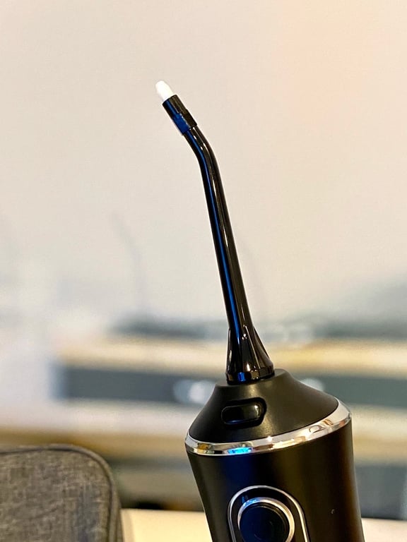 MÁY TĂM NƯỚC CẦM TAY DOZZI