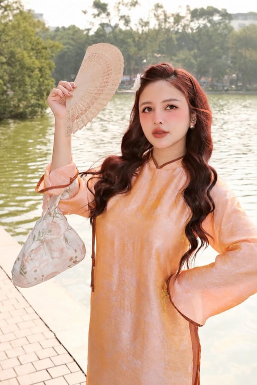 AD tằm óng cam nơ hoa (S->XXL)