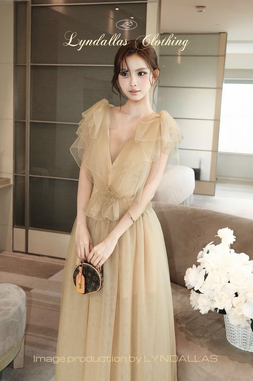 Váy nâu hoa bụng bèo tay áo