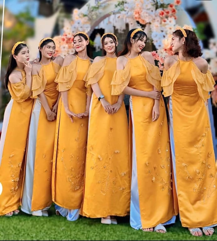 Áo dài xanh mint rớt vai