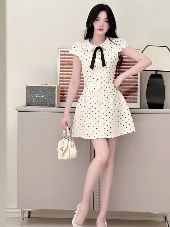 Đầm chấm bi phối nơ đen