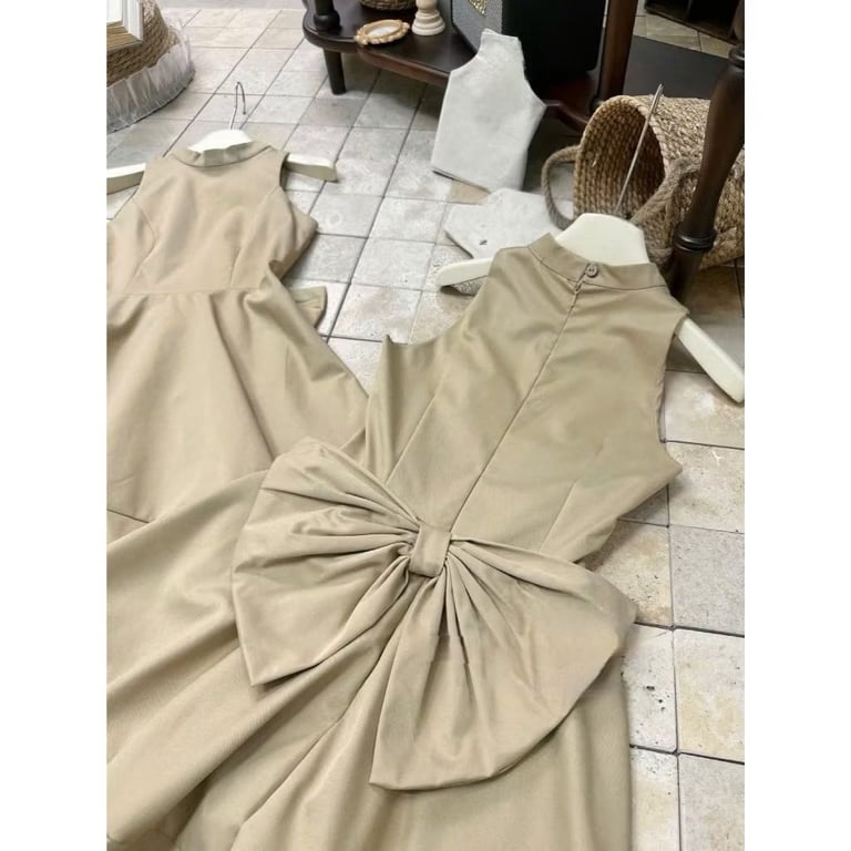 Kim Ny | Váy kaki nâu tây thiết kế cổ yếm phối nơ lưng phong cách tiểu thư