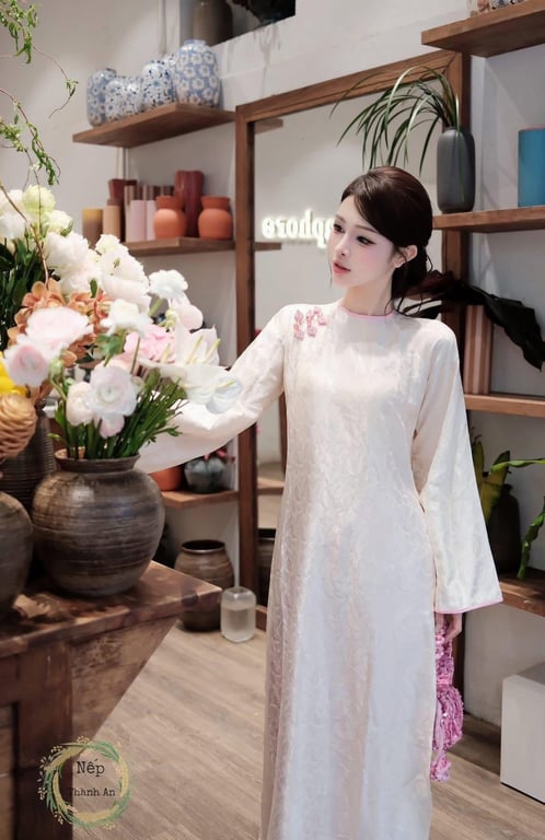 Áo dài lụa trắng viển hồng - freesize