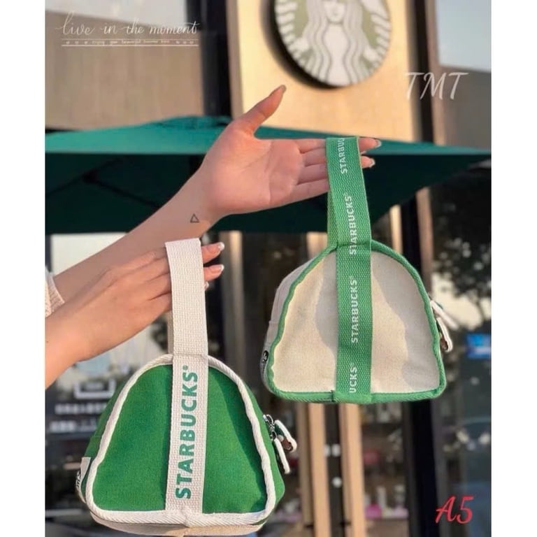 túi nhỏ xinh hình tam giác . Mẫu mới nhất có kèm khoá lo.go S.T.A.R.B.U.CK