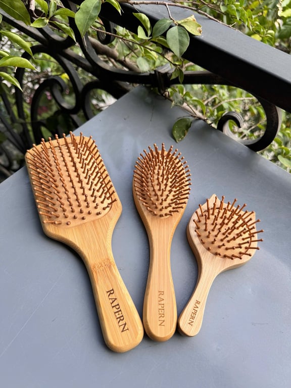 LƯỢC ĐỆM KHÍ MASSAGE DA ĐẦU – RAPERN NC269