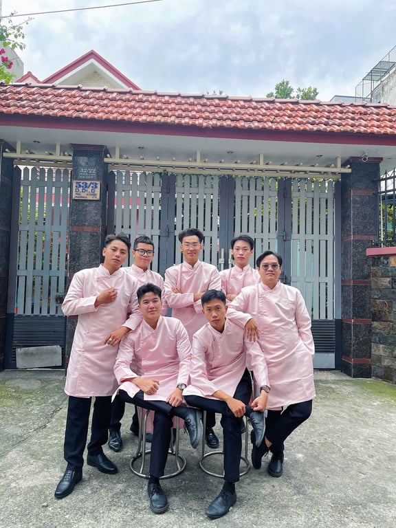 Áo dài bưng quả nam hồng phấn