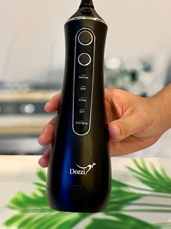 MÁY TĂM NƯỚC CẦM TAY DOZZI