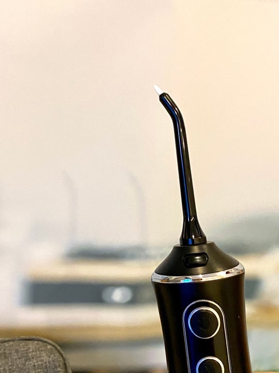 MÁY TĂM NƯỚC CẦM TAY DOZZI