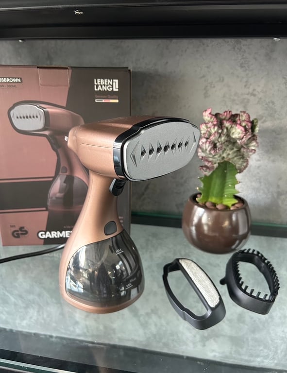 BÀN LÀ HƠI NƯỚC CẦM TAY LEBENLANG ĐỨC LBD528S MÀU HỒNG