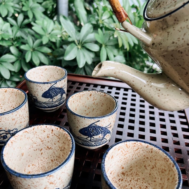 BỘ ẤM TRÀ GỐM SỨ CAO CẤP HOA VĂN CỔ