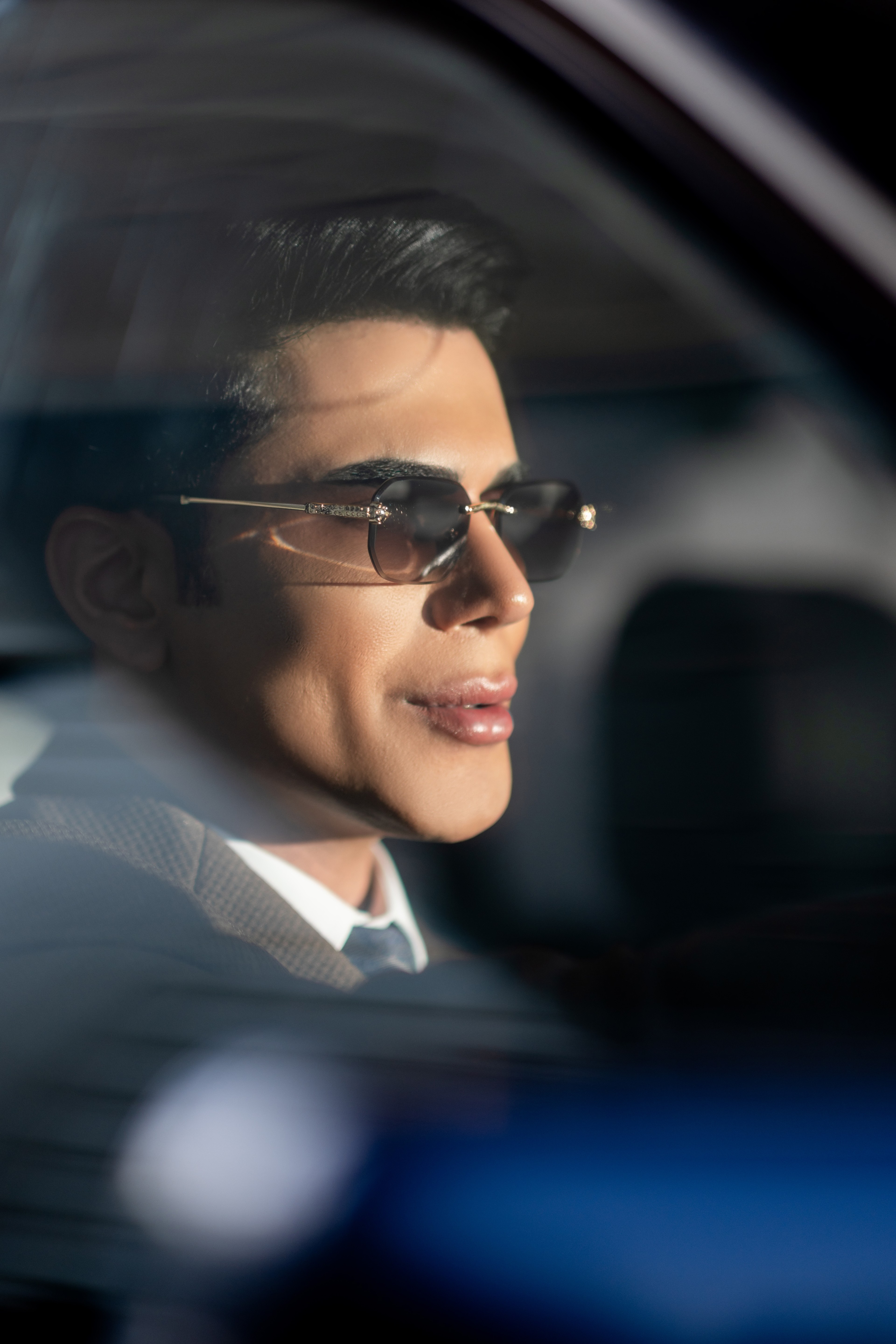 Ken wearing Ormont № 09 Photochromic Brown · gold